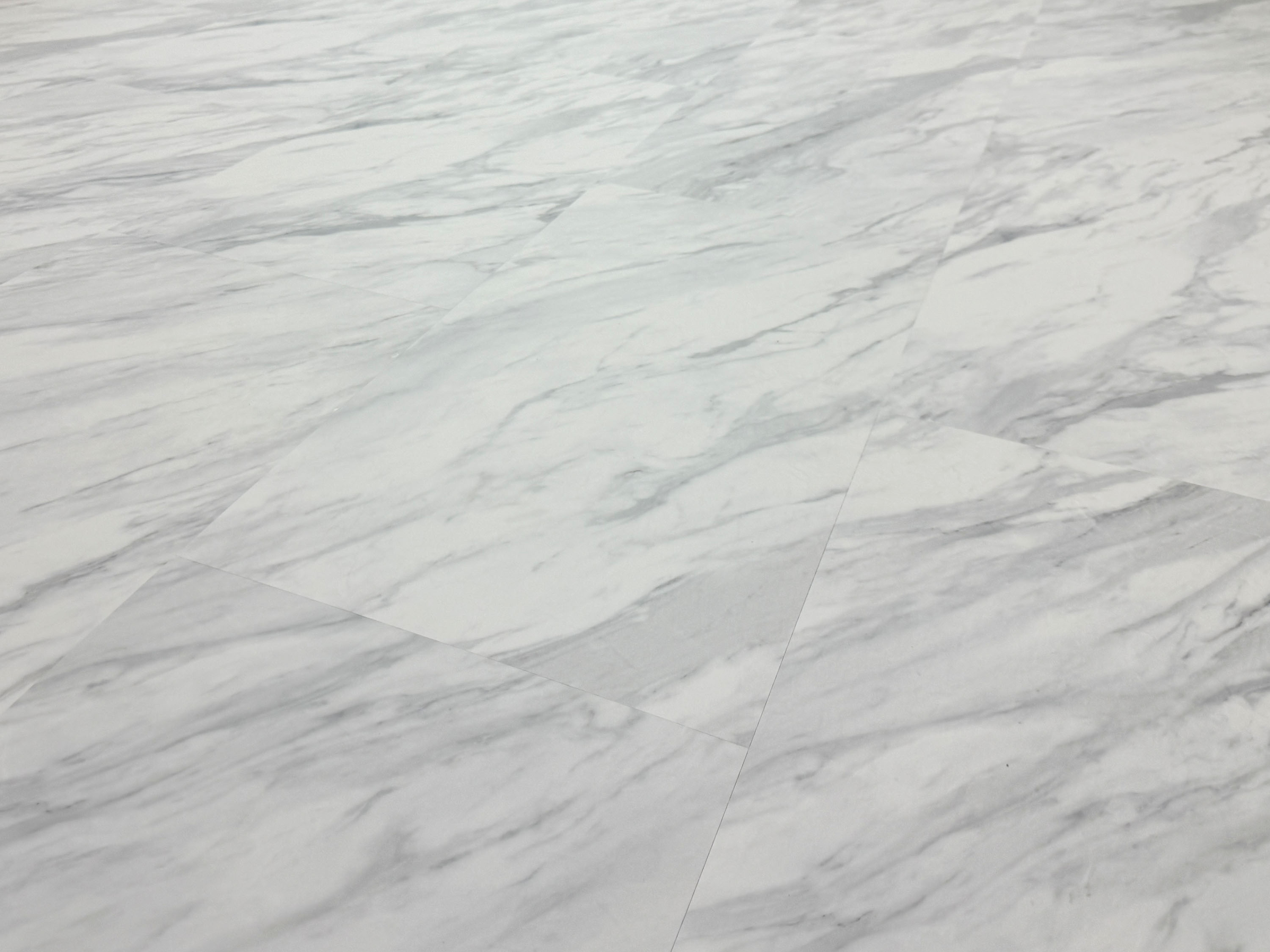 TRECOR® SPC/ RIGID Klick Vinylboden Fliesendekor - Carrara Marmor mit V- Fuge 4.2 mm TRECOR® SPC/ RIGID Klick Vinylboden Fliesendekor - Carrara Marmor mit V- Fuge 4.2 mm